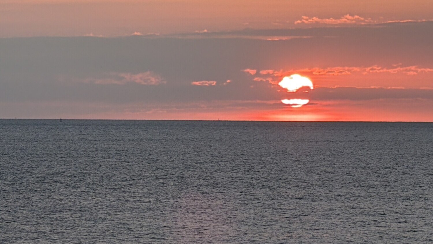 Sun Rising through the Clouds over the Atlantic Ocean
