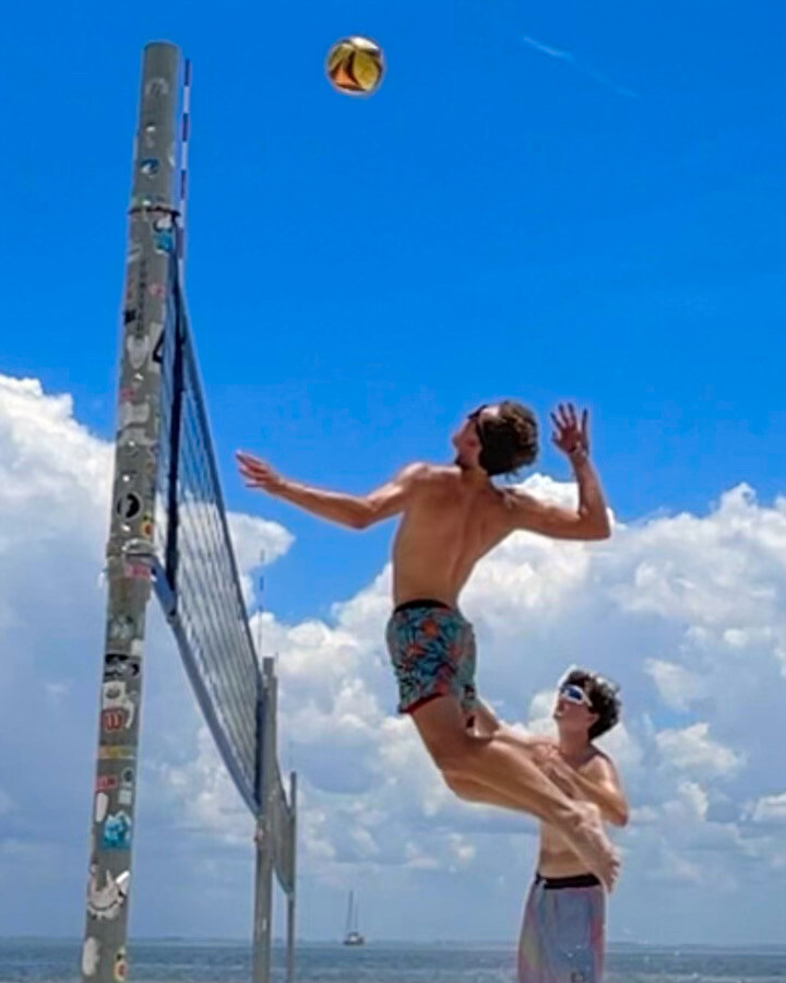 Tyler and Ryan training for beach volleyball
