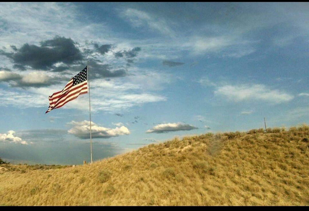 Flag on top of the world