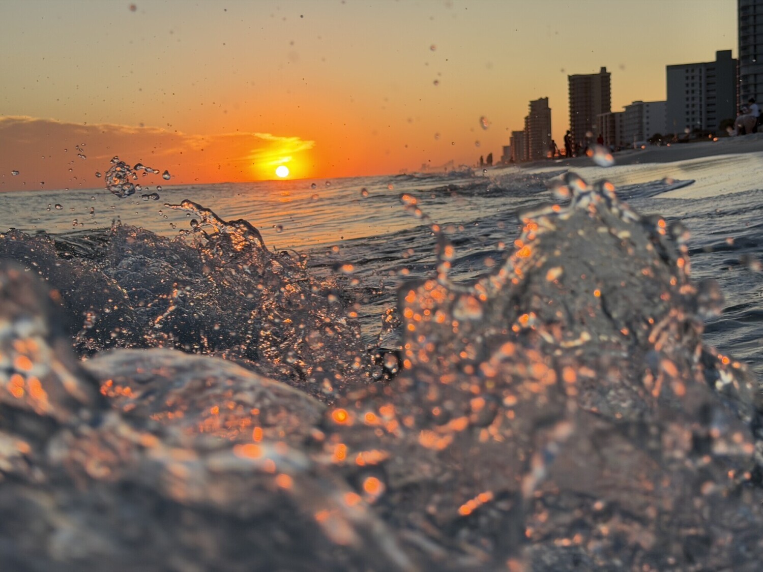 Sunset through the waves