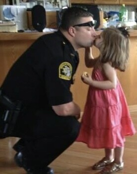 Kissing daddy good-bye