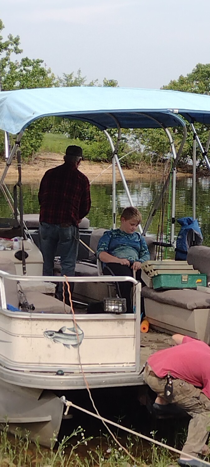 Papa and his boys fishing