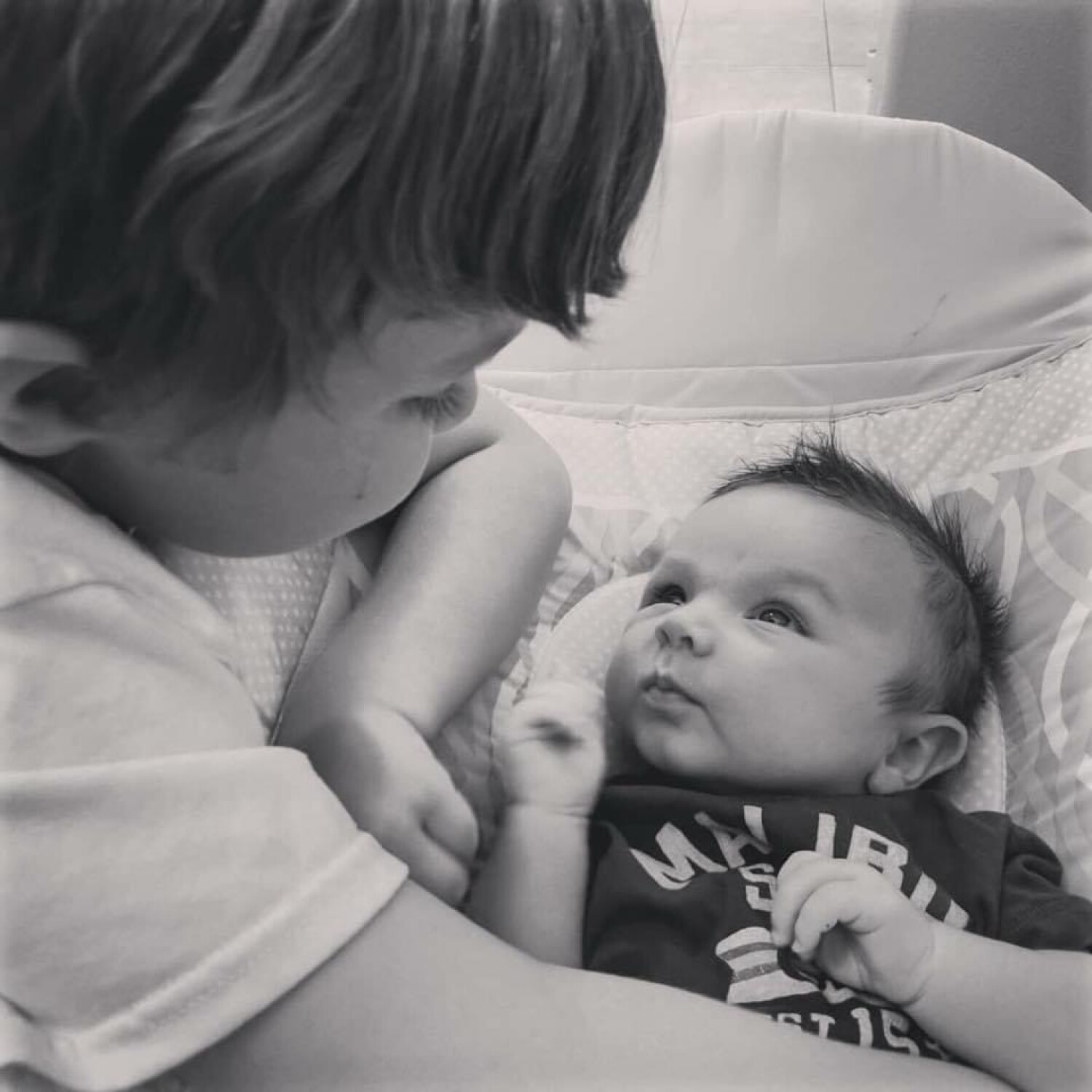 Brother has new baby brother