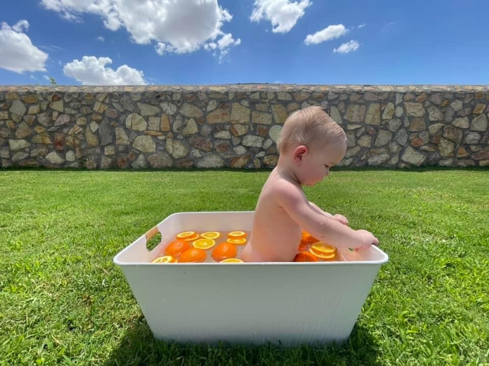 Sam’s bath of oranges!