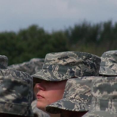 Kayla in a sea of hats