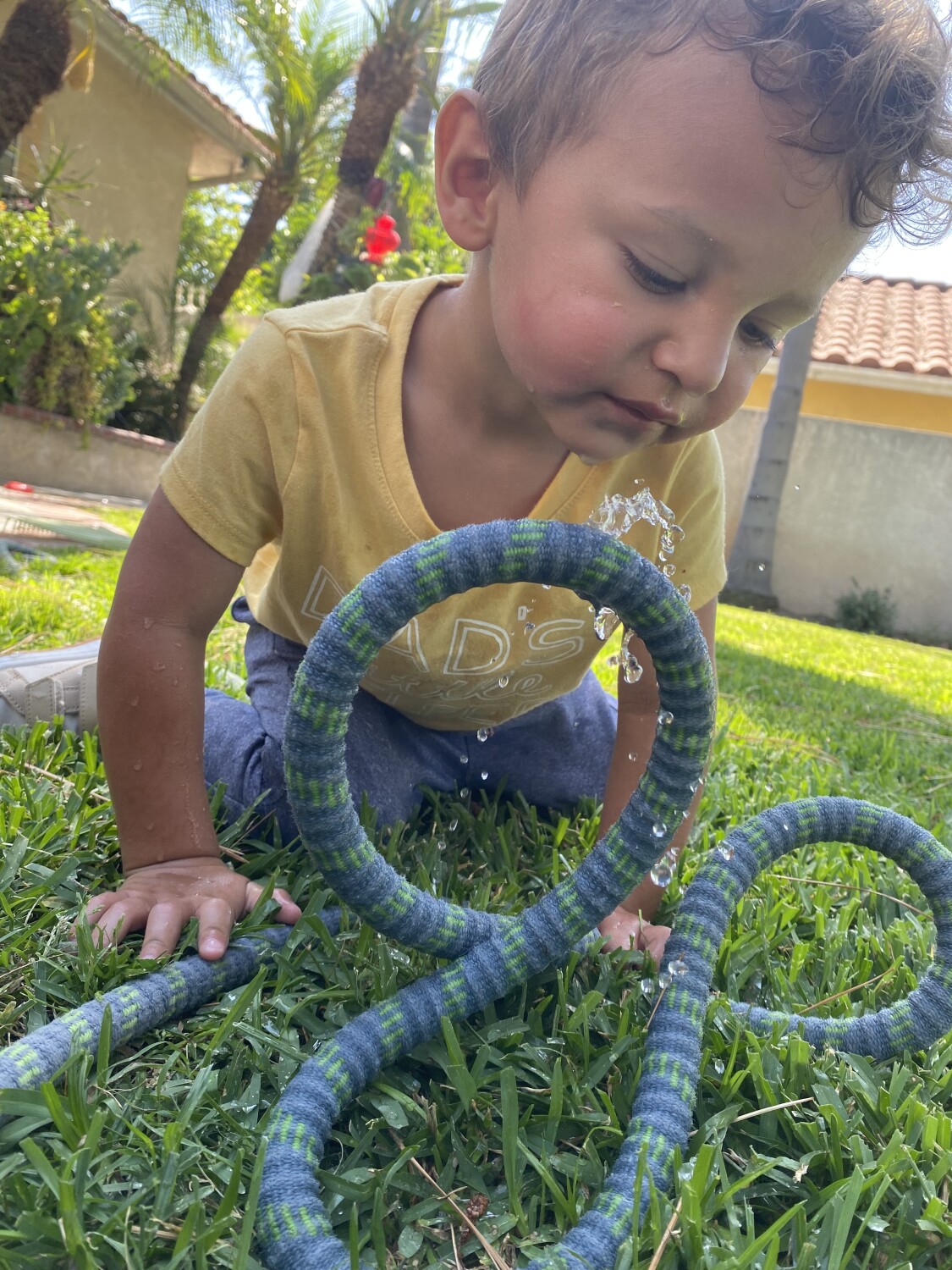 Boy playing with water