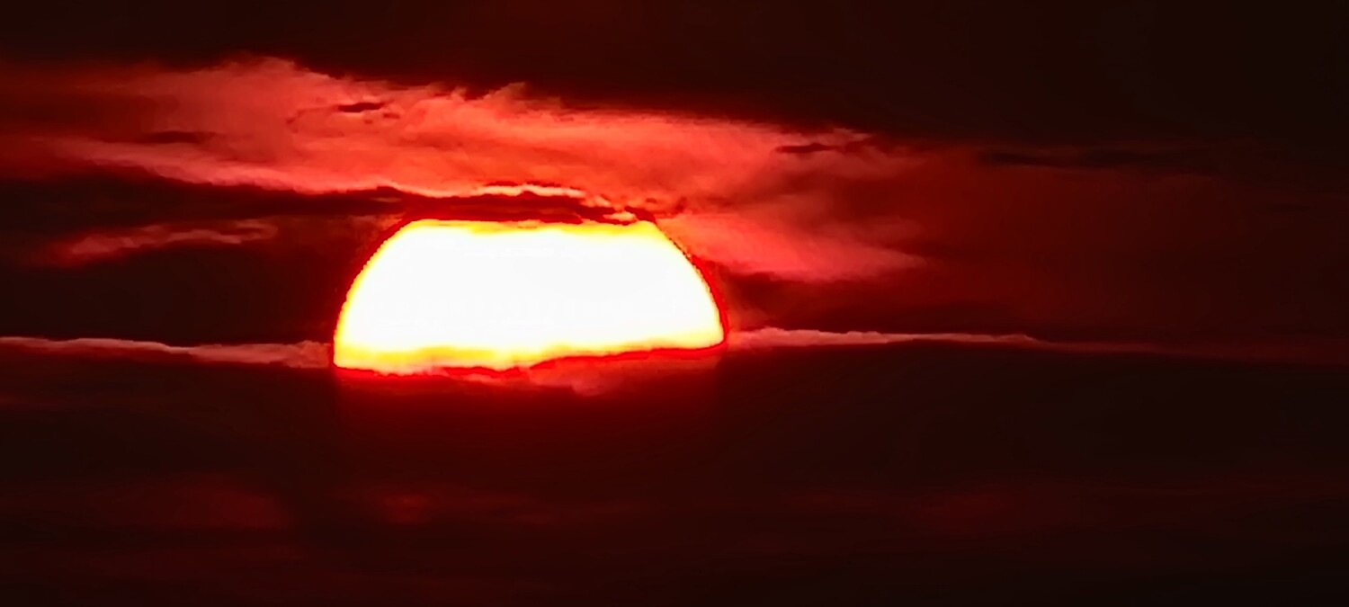 Sun setting peekaboo