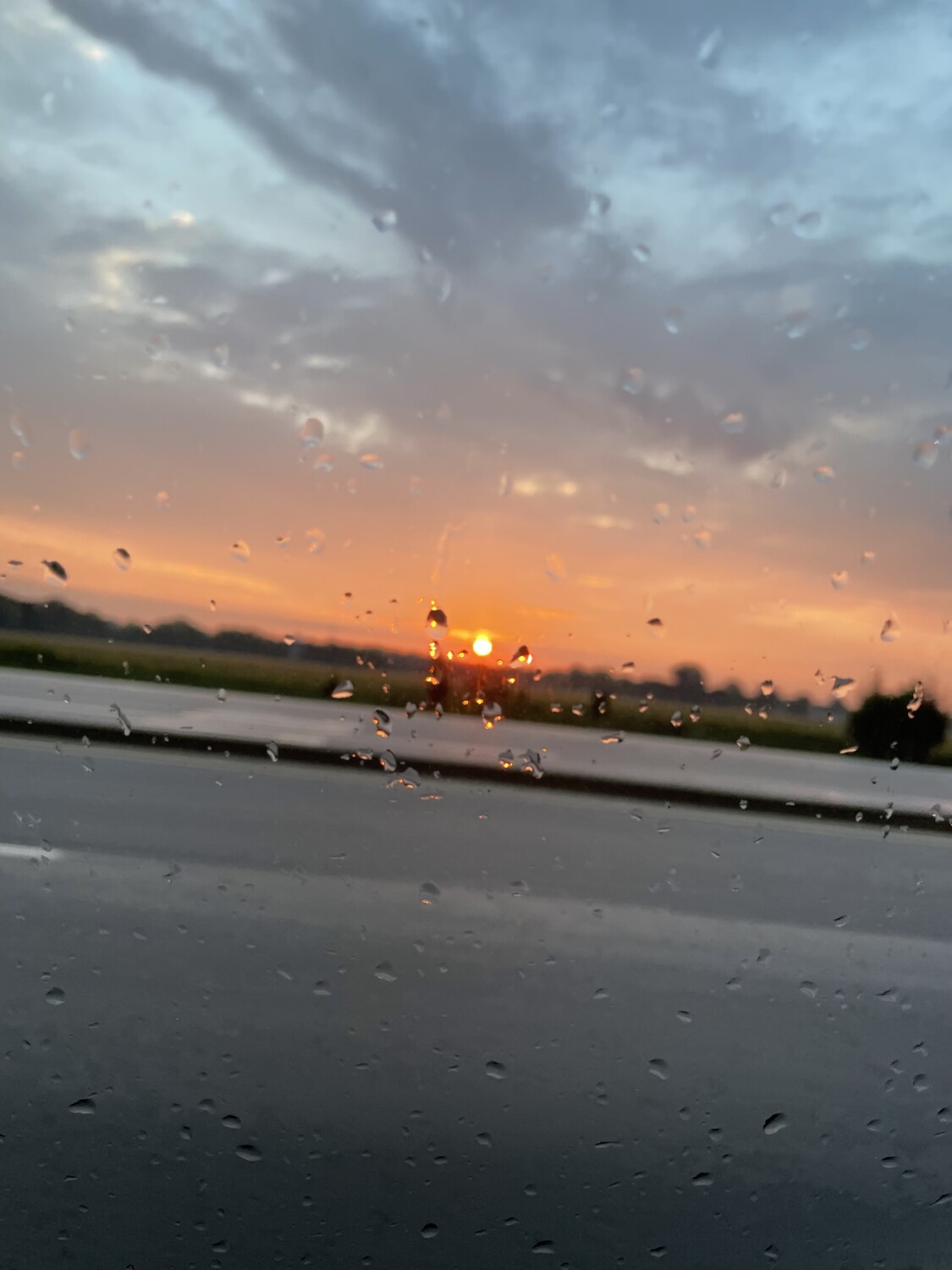 Raindrops around the sunrise