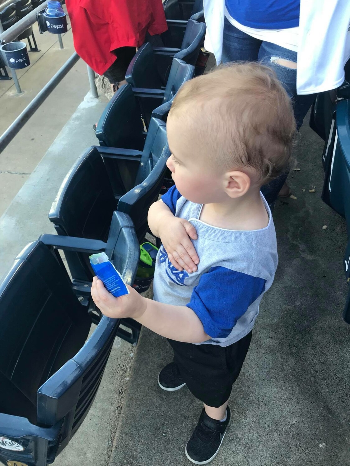 Lincoln with his hand over his heart in respect