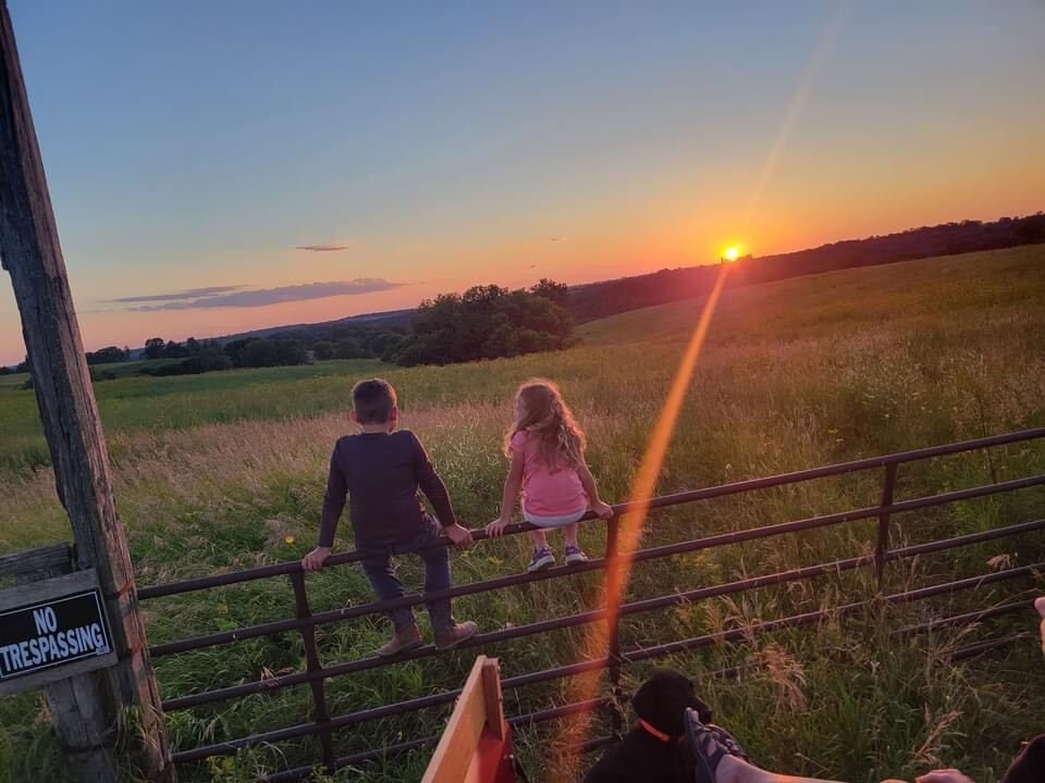Grandkids watching the sun go down.
