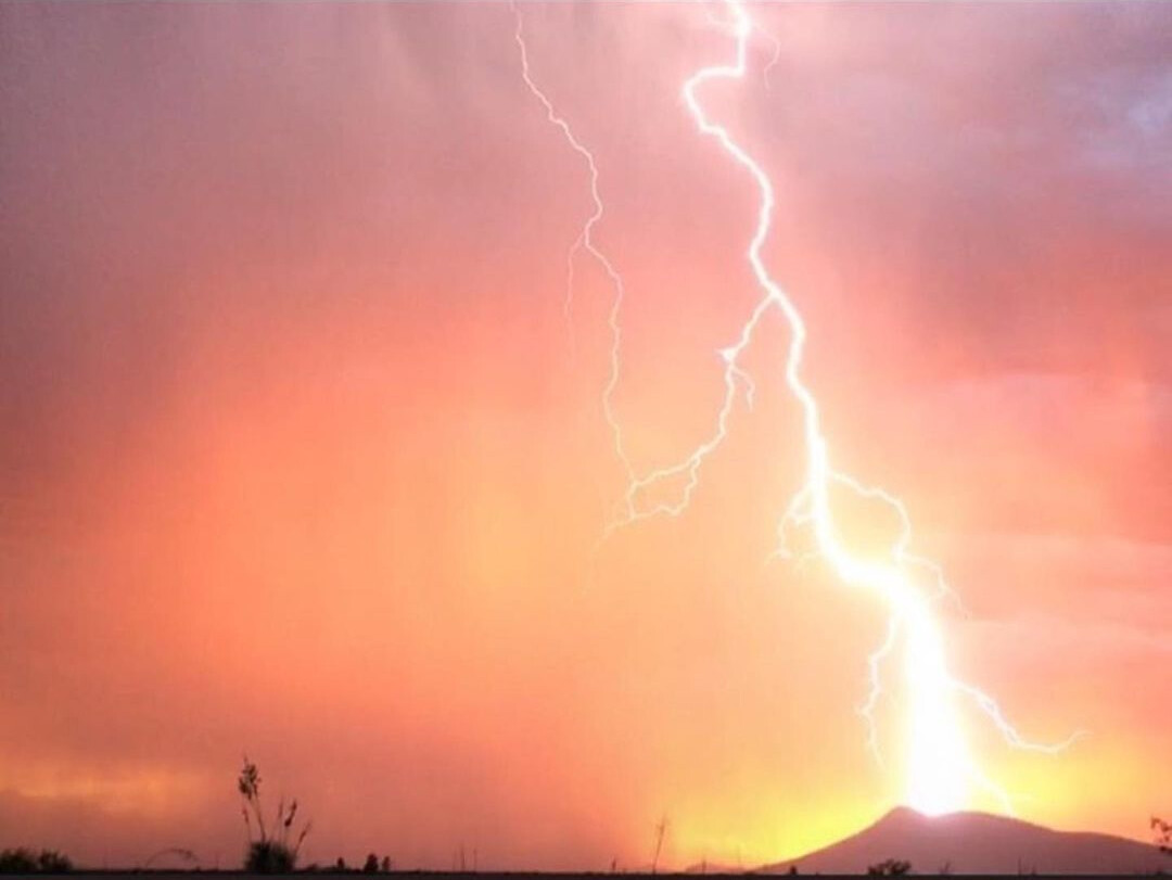 Lightning Hitting Black Mountain