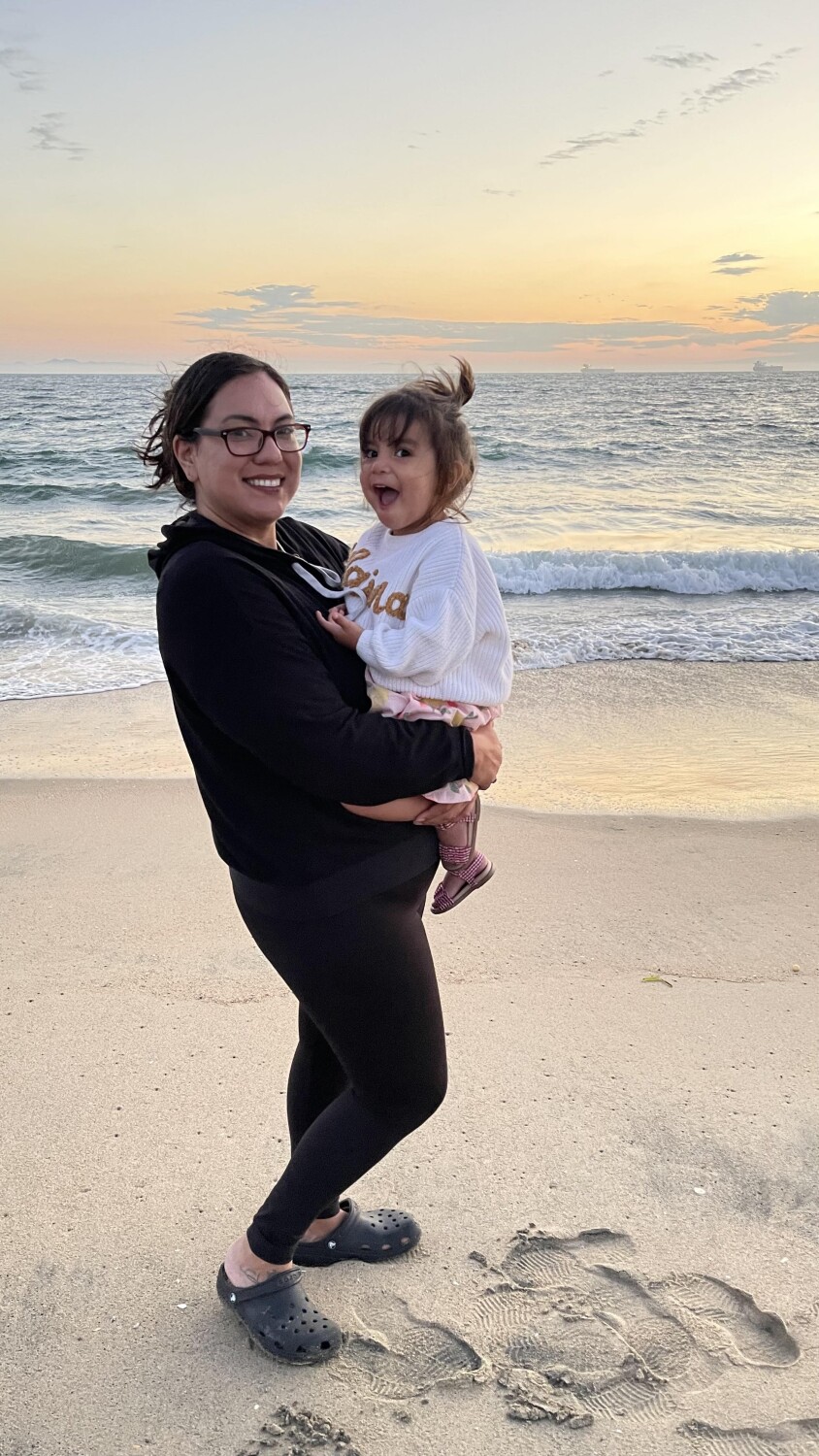 Baby's first time at the beach.