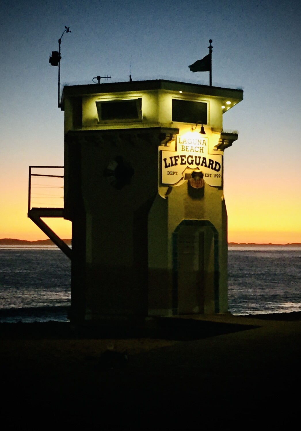 Here with a beer, watching sunset disappear.