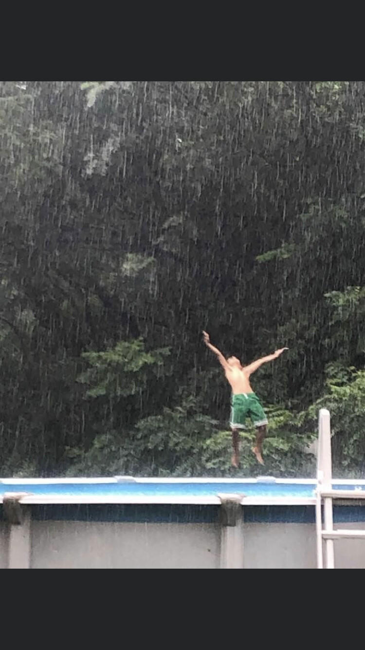 Jumping for joy, even in the rain.