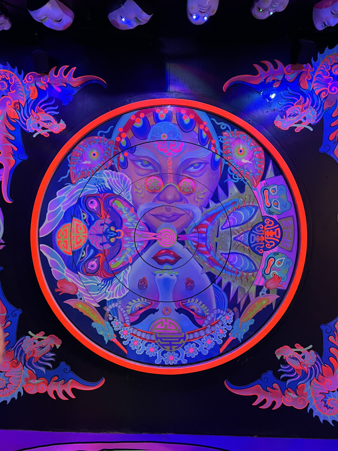 Neon  lights and faces in between