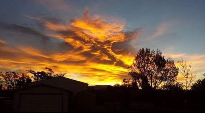 God' Hand touching the Cross