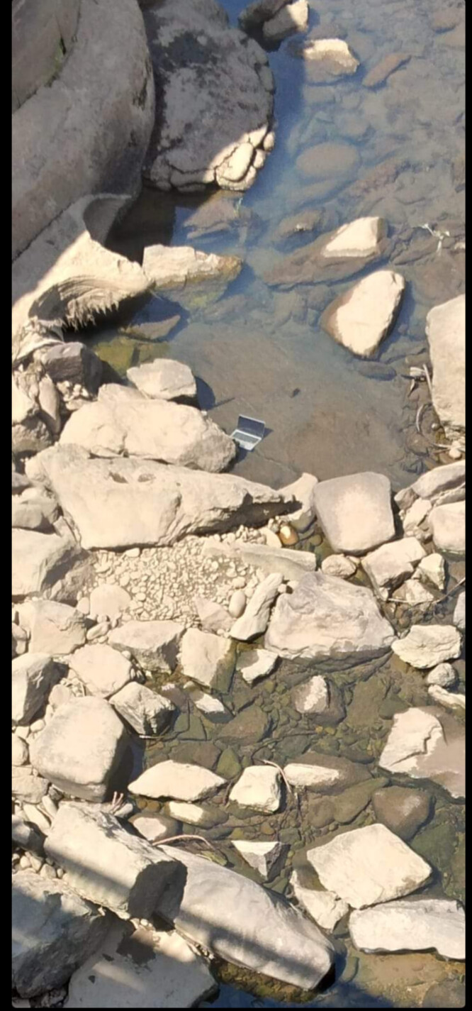 Delaware River includes water, rocks, and a Laptop