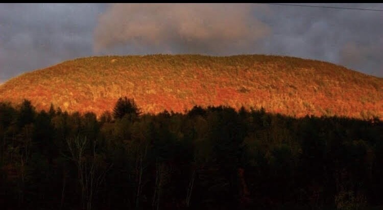 Sunlit fall mountain