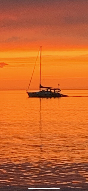 Superior sunset with sailboat