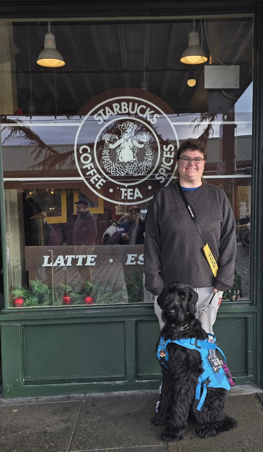 Remy the service dog visiting the first Starbucks