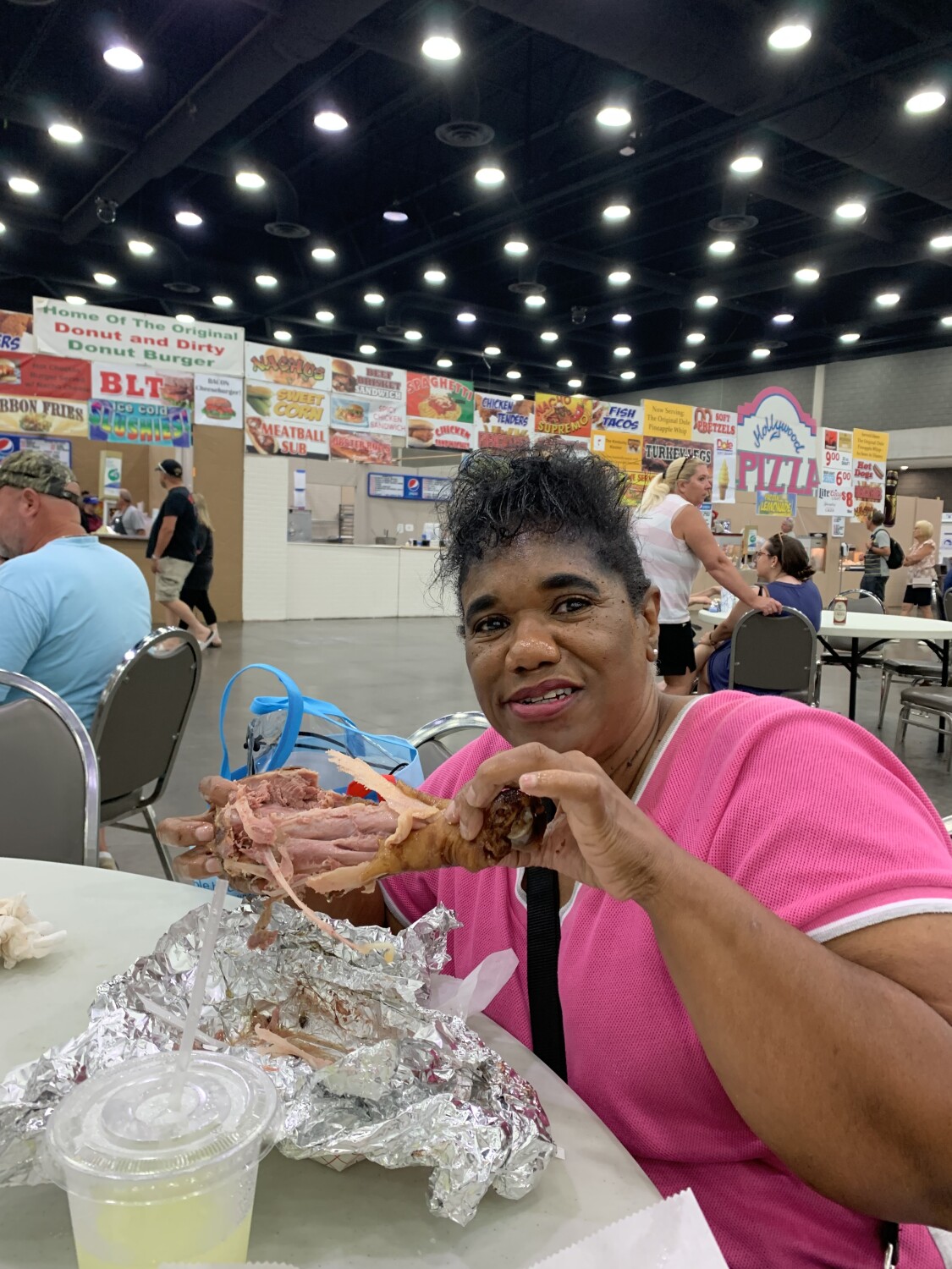 Eating a turkey leg down to the bone at Kentucky
