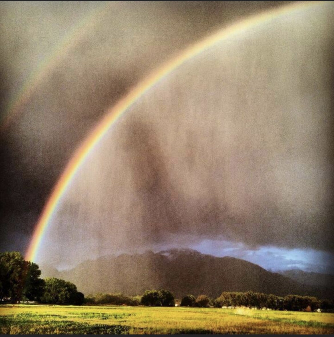 Freak Storm with Rainbow