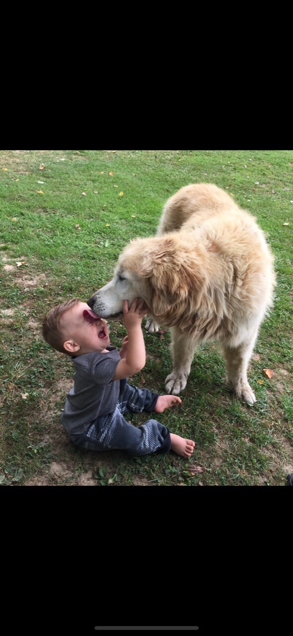 Toby giving Cody a kiss