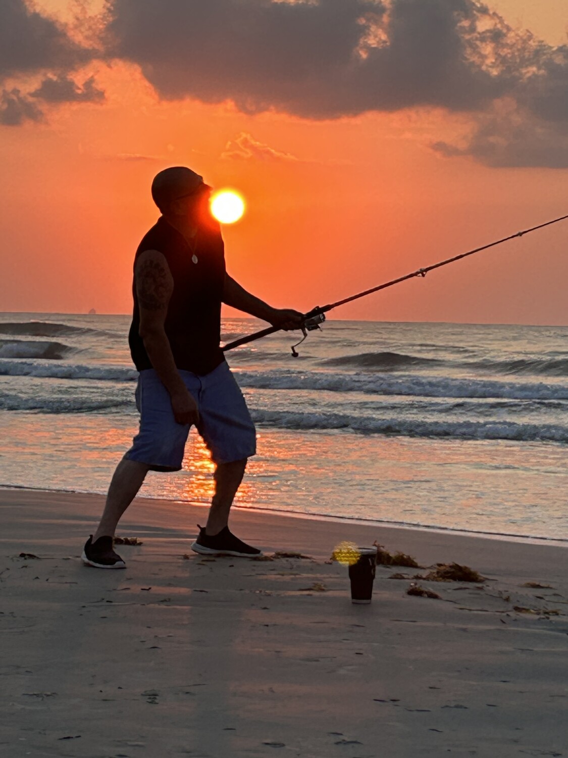 Husband goofing at the beach